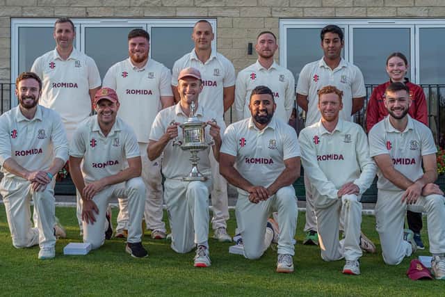 Woodlands show off the Bradford League Premier Division trophy they have won for a fourth consecutive time. Photo by Ray Spencer
