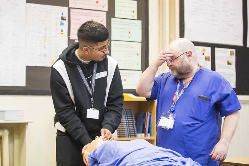 Student Basit Ali with Steve Kirk during an airways demonstration.