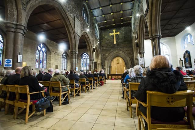 The Remembrance Sunday service taking place at Dewsbury Minster last year.