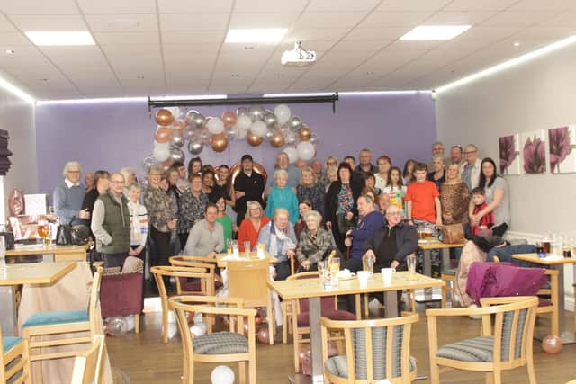 Sarah, standing front middle, celebrated her 100th birthday with a party which was attended by 60 friends and family.