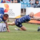 Johnny Campbell in try scoring action in his Batley Bulldogs days, diving over the line in the big Championship play-off semi-final at Featherstone Rovers. Picture: Neville Wright