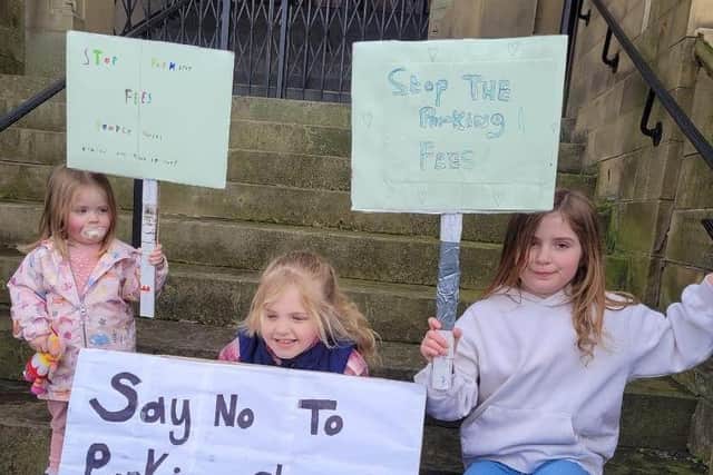 Remy, Amelia and Lydia at the protest march in Cleckheaton on Saturday.