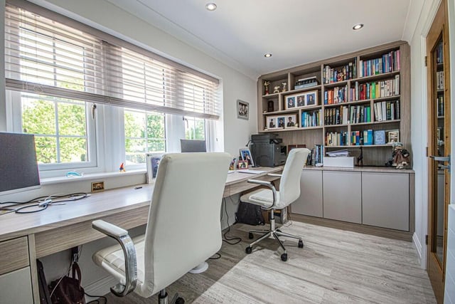 One first floor bedroom has been adapted to use as a home office.