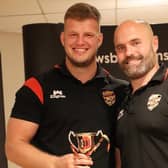 Dewsbury Rams' Jimmy Beckett being presented with the head coach's player of the year award by Liam Finn. (Photo credit: Thomas Fynn)