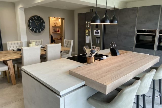 The open plan living kitchen creates the ultimate family space, with bi-folding doors opening to the rear garden.