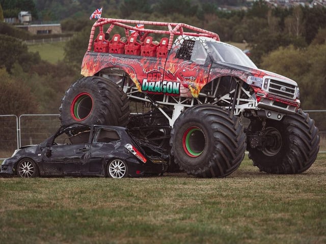 A monster truck from Red Dragon Monster Trucks in action.
