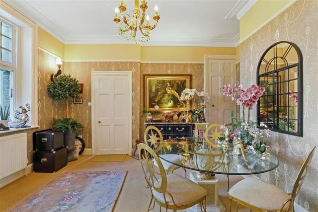 An elegant dining room, with plenty of natural light.
