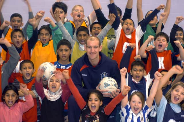 Huddersfield Town ambassador Andy Booth at a half term multi-sports session at Westmoor Junior School, Dewsbury Moor, in February 2010
