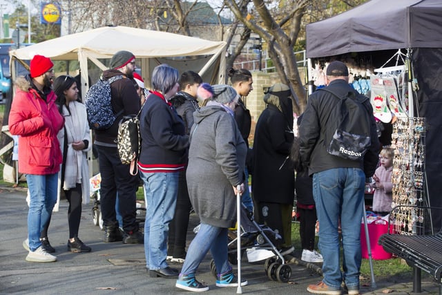 People enjoying the Heckmondwike Christmas market.
