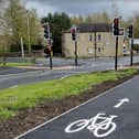 Take a look at these recent photos of the newly installed traffic lights and pedestrian controlled crossings at the top of Hartshead Moor, on the A649 Halifax Road.