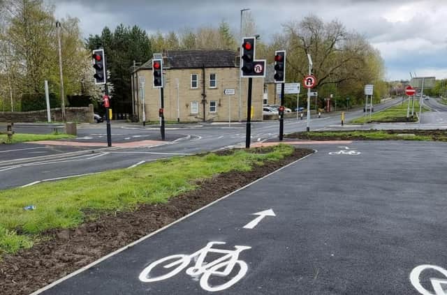 Take a look at these recent photos of the newly installed traffic lights and pedestrian controlled crossings at the top of Hartshead Moor, on the A649 Halifax Road.
