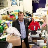 Ridvan Turhan, owner of Town Cafe Turkish Bistro, Dewsbury, with some of the donations he has received from the community for the response for aid for the victims of the earthquake in Turkey and Syria.
