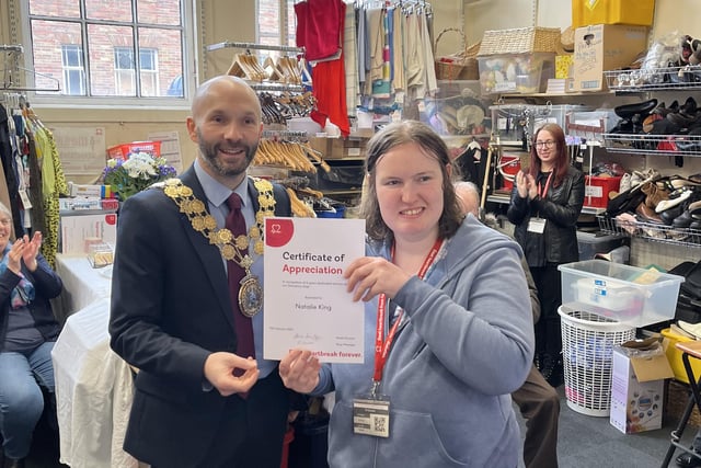 The British Heart Foundation charity shop in Dewsbury town centre has celebrated its 25th anniversary.
