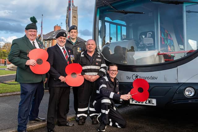 Terry Wood, President, Royal British Legion; veterans Brian Whittaker and John Mainland; and Transdev engineers Patrick Mclaughlin and Stephen Buckley. Picture: Studio 3000