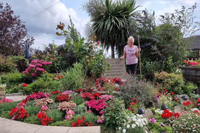 Carol Wood and her display at the Old Colonial which was visited by Yorkshire in Bloom judges.