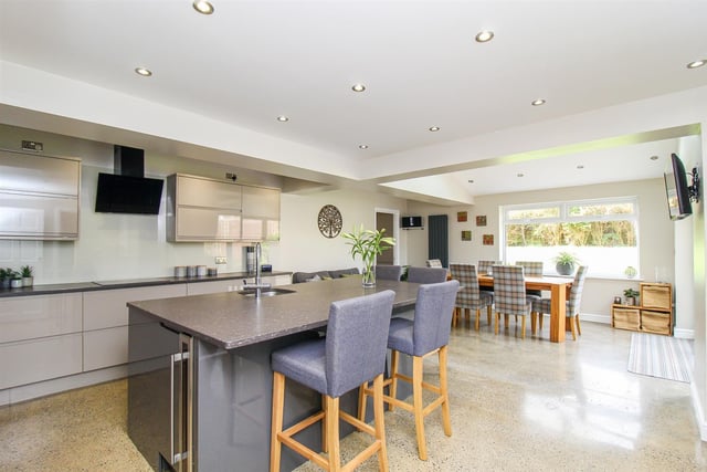 The open plan living and dining kitchen is the hub of the home.