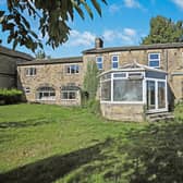 This five bedroom home has a paddock and stables included in its sale.