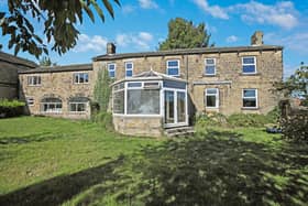 This five bedroom home has a paddock and stables included in its sale.