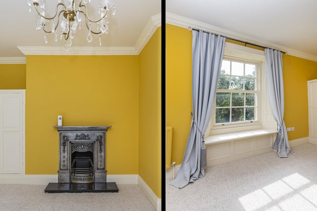 A lovely period fireplace, and a window seat, the latter featuring in some of the bedrooms.