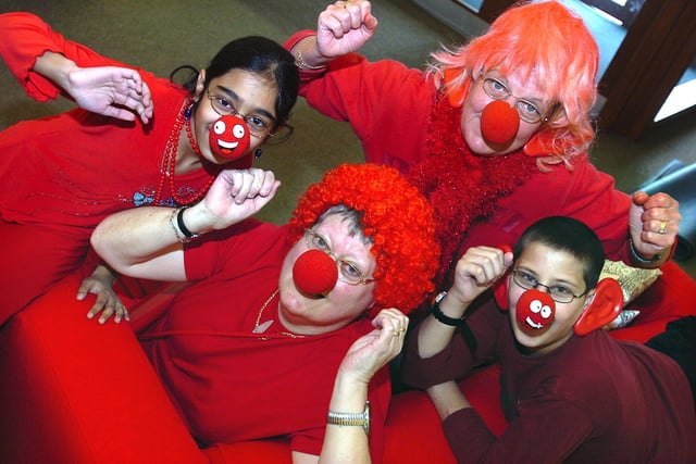 Pupils Amina Saloo and Mozaffar Hussain with teachers Christine Parr and Angela Akroyd join in the fun for Red Nose Day at Staincliffe C of E Junior School in 2007