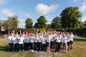 More than 100 volunteers from Johnstone's Paint in Birstall helped to transform the Hollybank Trust's site in Mirfield.