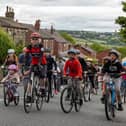 Riders make their way up the Roberttown Lane climb during the 2022 event. (Image: Leeds Media Services)