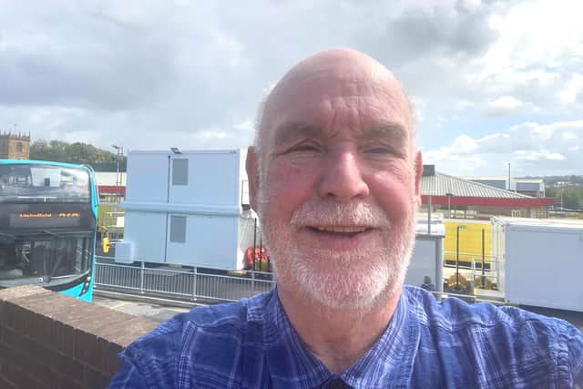 Coun Eric Firth at Dewsbury Bus Station, where work continues on the new facility which is due to open in autumn 2026.