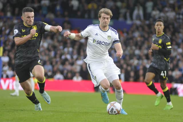 Patrick Bamford charges into attack for Leeds United after coming off the bench against Aston Villa.