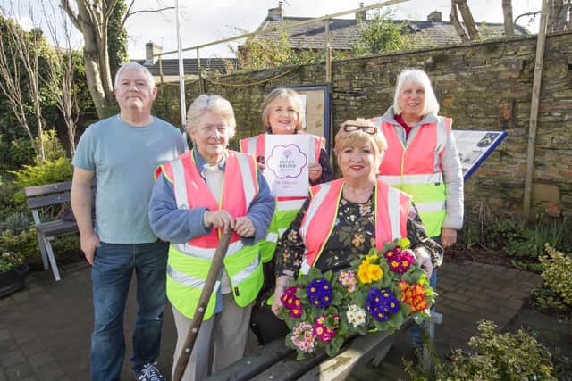 Volunteers from Roberttown in Bloom, from the left, Paul Smith, Sue Harris, Fiona Smith, Louise Hardy and Janet Thewlis, at the village's Jubilee Garden.