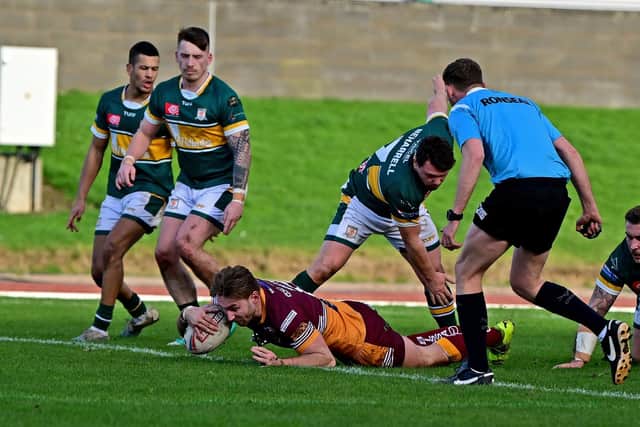 Ben White scores a try for Batley in their 1895 Cup win at Hunslet in February.