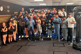 Team Agoge boxers and staff with local MP Iqbal Mohammed who visited the Dewsbury gym and offered encouragement.