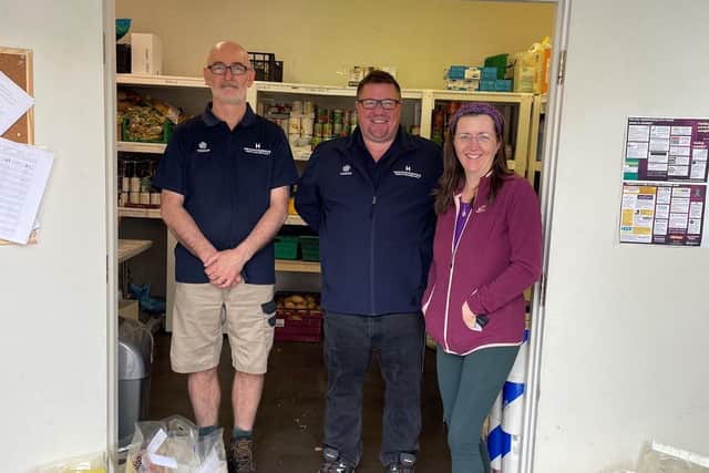Josie Pugsley, right, trustee at Cleckheaton Food Bank, with staff from National Floorcoverings, including Jason McKelvie, centre, who provide volunteers every Wednesday to the food bank.