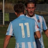 Match winner Finn Donovan is congratulated by teammate Kelan Swales who was also on target for Liversedge against Stocksbridge Park Steels. Picture: Alexander Murphy