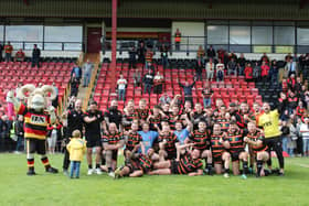 Dewsbury Rams celebrate on the pitch after claiming the League 1 title - they could be also celebrating at the Town Hall in a few weeks with a planned civic reception on the cards. (Photo credit: Thomas Fynn)
