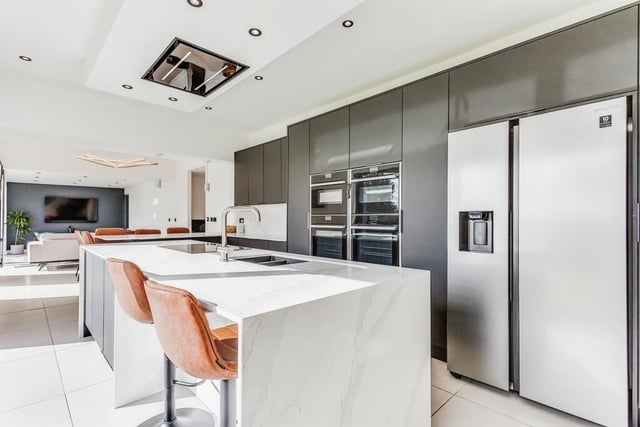 The super-sleek, contemporary kitchen is part of the open plan ground floor accommodation.