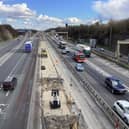 Work is progressing on the M62 central barrier in West Yorkshire which is set to be completed in September.
