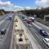 Work is progressing on the M62 central barrier in West Yorkshire which is set to be completed in September.