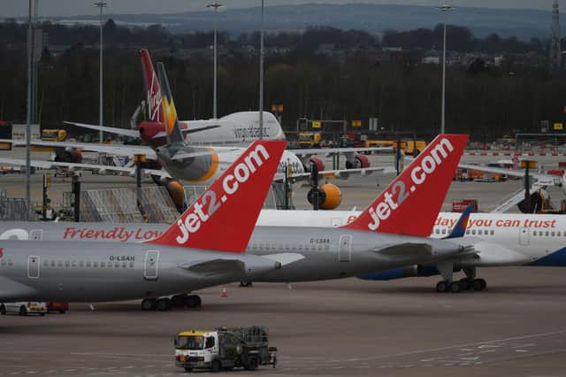 Planes are parked on the tarmac at Manchester Airport on March 17, 2020, as travel restrictions due to COVID-19 take hold. Photo: Getty Images
