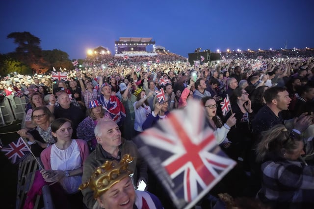 Crowds enjoying the Coronation Concert (Photo by Kin Cheung-WPA Pool/Getty Images)