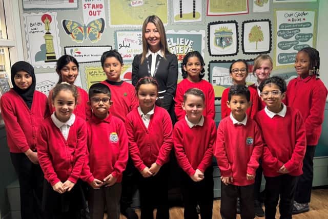 Proud headteacher of Healey Junior School, Luisa Lang, with some pupils from Years 2, 3, 5 and 6, after learning about their positive Ofsted report.