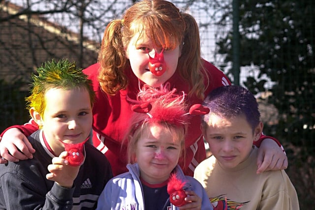 Pupils at St. Peter's Junior School, Birstall, got into the swing of Red Nose Day in 2005. Pictured left to right are, front row, Kieran Cockroft (9), Robyn Haynes (5) and Corey Hall (10) and, back row, Rebecca Watson (11)