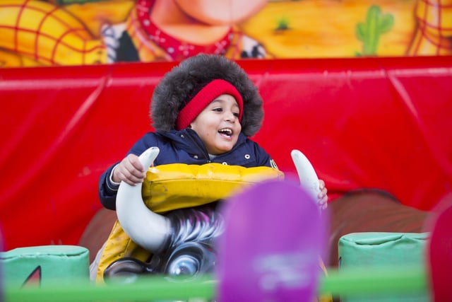 Mohammad Aahil Hussain enjoying a fairground ride.