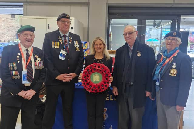 Spen Valley MP Kim Leadbeater with Royal British Legion representatives launching this year's Poppy Appeal in Mirfield.