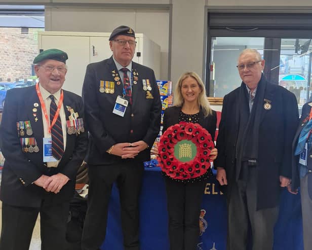 Spen Valley MP Kim Leadbeater with Royal British Legion representatives launching this year's Poppy Appeal in Mirfield.