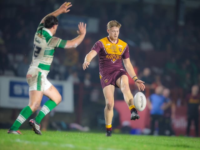 Louie Walker controlling the game for Dewsbury Moor Maroons in their Heavy Woollen Cup final.