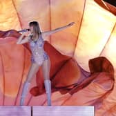Taylor Swift performs onstage for the opening night of The Eras Tour (Getty Images)