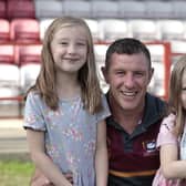 New Batley Bulldogs' head coach Mark Moxon with his daughters, Isabella, left, and Pippa, right. (Photo credit: Neville Wright)