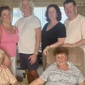 Kevin and Mary Stenson, with their four children Mark, John, Jane, and Elizabeth.