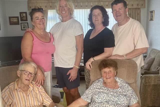Kevin and Mary Stenson, with their four children Mark, John, Jane, and Elizabeth.