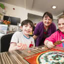 Gaming Club at Sensory World, Dewsbury. From the left, Bruce Watts, eight, owner Linda Holmes and West Yorkshire ADHD Support Group organiser Jo Brett.